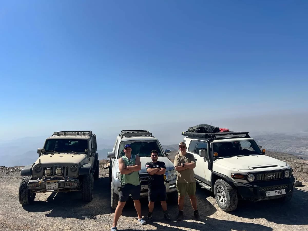 A friendly crew of drivers with their 4x4s